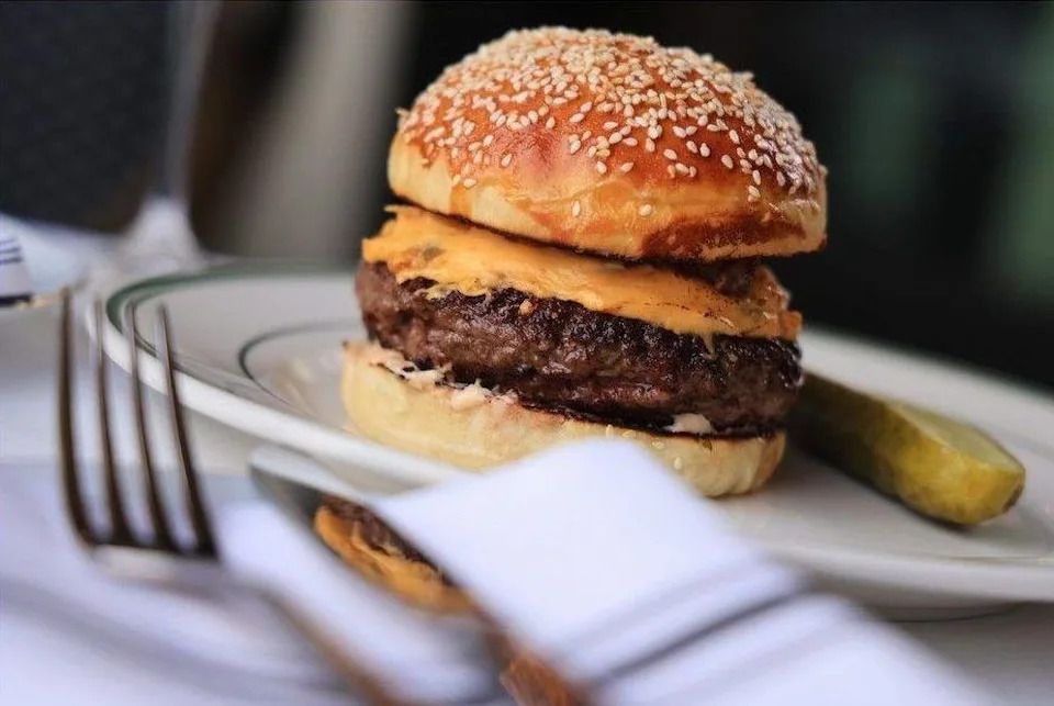 The signature burger at Penny Crown is homemade, from the duck-fat-enriched bun to the medley of cheeses. Gavin Young/Postmedia