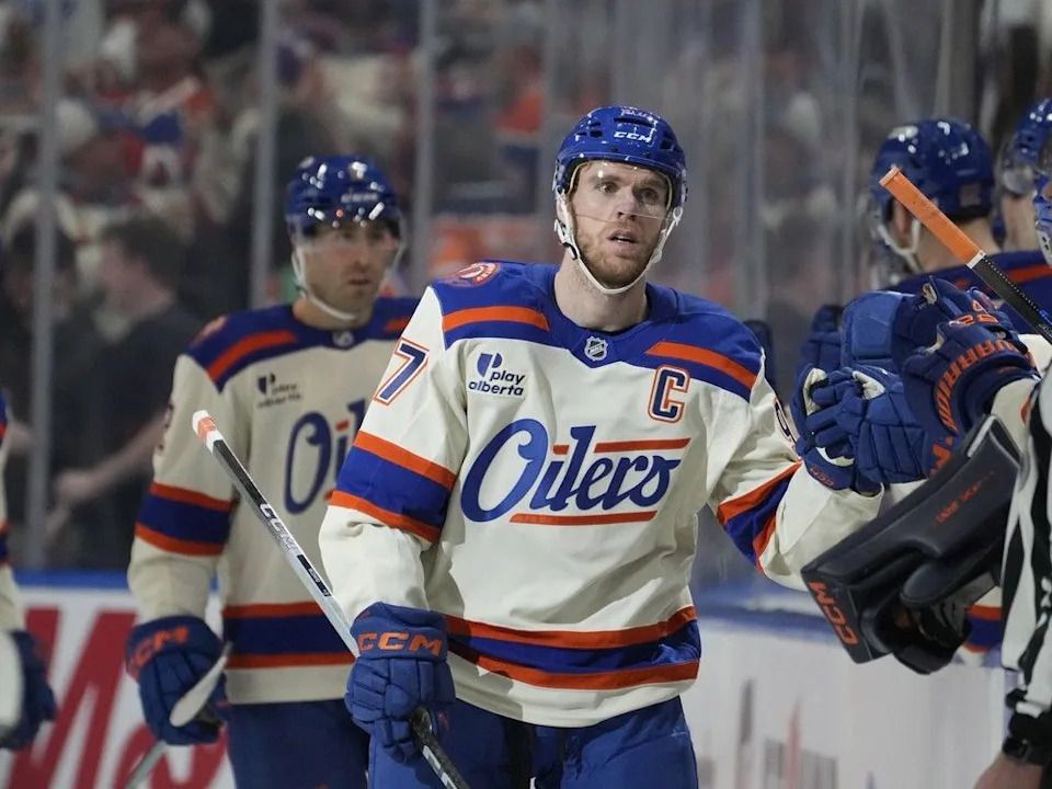 Edmonton Oilers Connor McDavid (97) celebrates his goal with teammates against the Seattle Kraken during second period NHL action on Thursday, December 4, 2025 in Edmonton.