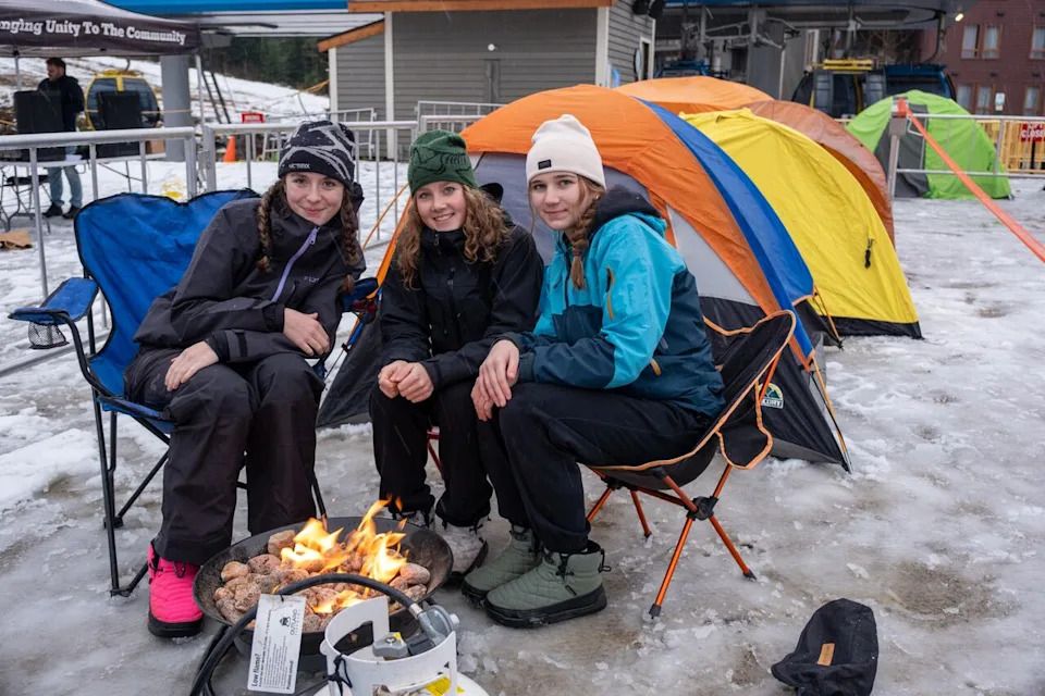 Three Grade 11 Revelstoke Secondary School students and skiers on the mountain’s freeride team, Stella, Amber, and Zaya, set up their tent at noon on Dec. 5.