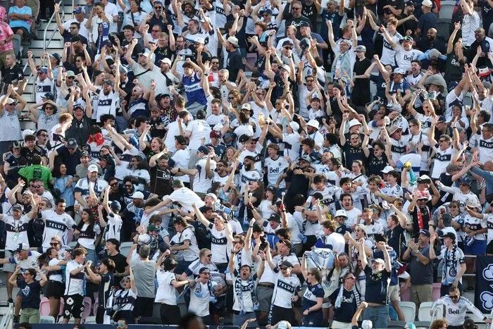 Vancouver Whitecaps FC fans cheer during the Audi 2025 MLS Cup Final match between Inter Miami CF and Vancouver Whitecaps FC at Chase Stadium on Dec. 6, 2025 in Fort Lauderdale, Florida.