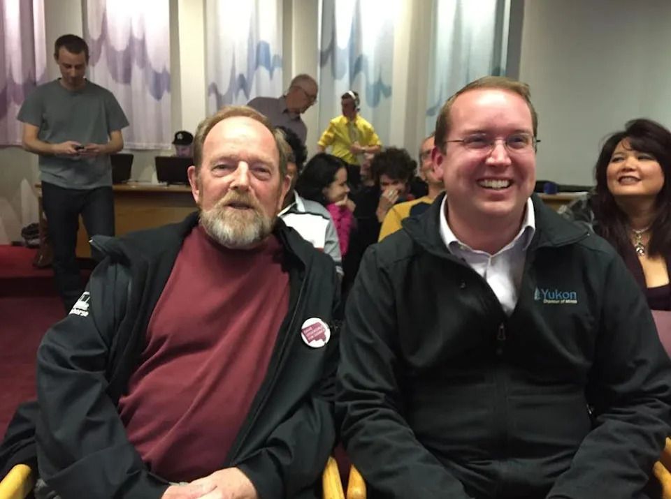 Dave Stockdale shares a laugh with Samon Hartland, who edged out Stockdale for the sixth and final seat on council. The loss ends Stockdale's 12-term run as a city councillor.