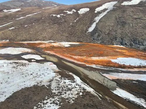 Brooks Range in northern Alaska (turning orange)/Josh Koch, U.S. Geological Survey