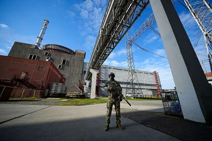 A Russian serviceman guards an area of the Zaporizhzhia Nuclear Power Station, 1 May, 2023