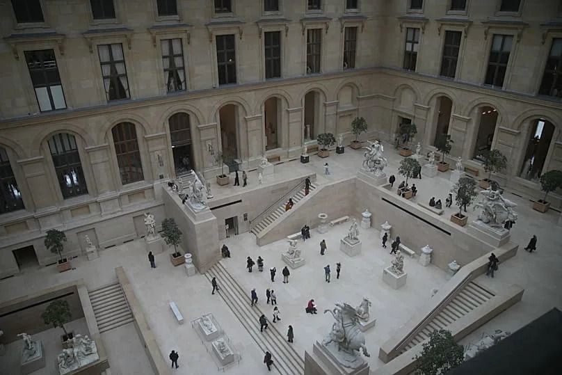 Visitors in the Richelieu wing of Le Louvre museum in Paris, 19 November, 2025