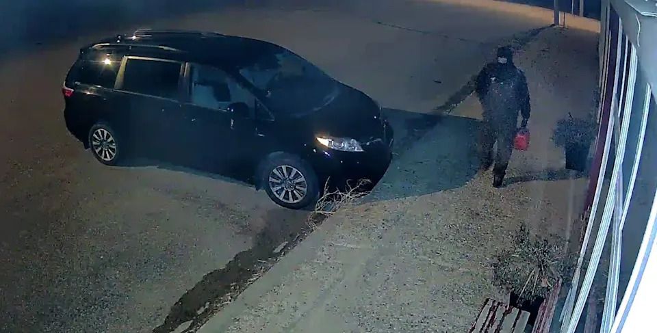 RCMP officers are seeking to identify a man captured on video near the scene of a suspicious residential fire.