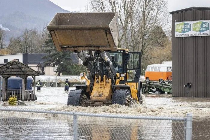 Water levels are rising at Boundary Road and Second Avenue on the Canada-U. S. border at Huntingdon on Thursday, Dec. 11, as water from recent rainfall spills into the Sumas Prairie. At least one business, Enviro Corp Recycling, was forced to evacuate.