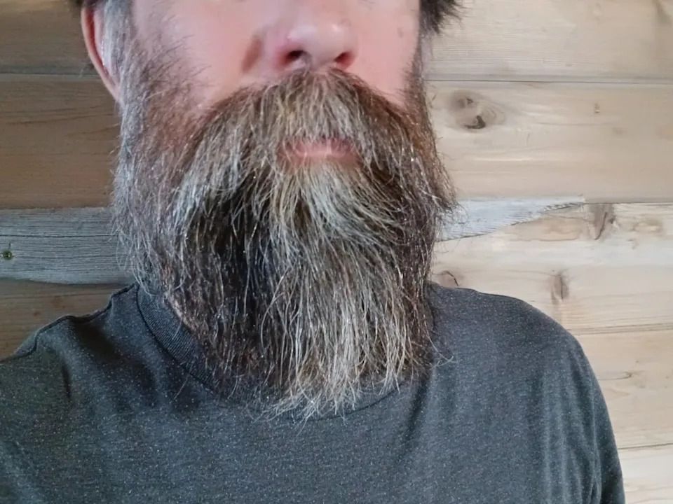 Johnathan Driscoll says his beard keeps him warm while he partakes in winter outdoor activities.