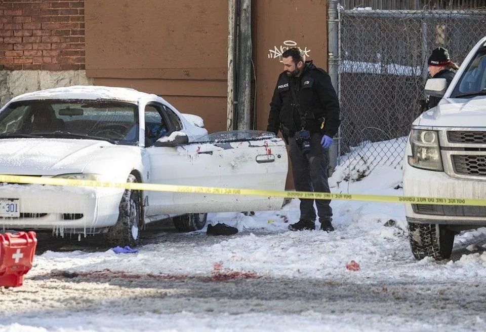 Forensics at the scene of a violent incident Sunday morning in downtown Ottawa.