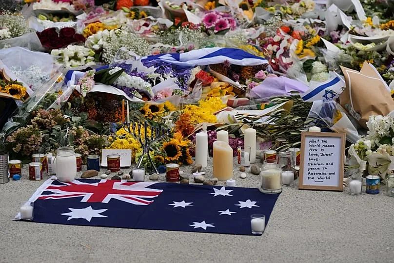 A tribute at a flower memorial by the Bondi Pavilion at Bondi Beach, 16 December, 2025