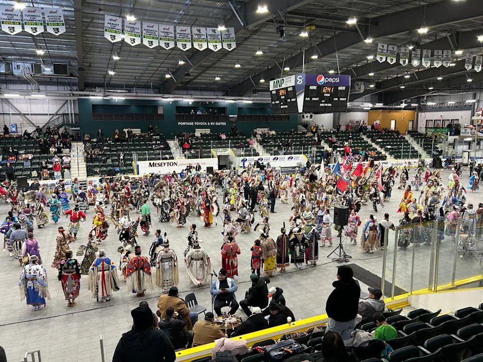 A throng of powwow dancers at Stride Place in Portage la Prairie, Man., on Saturday, Dec. 20, 2026.