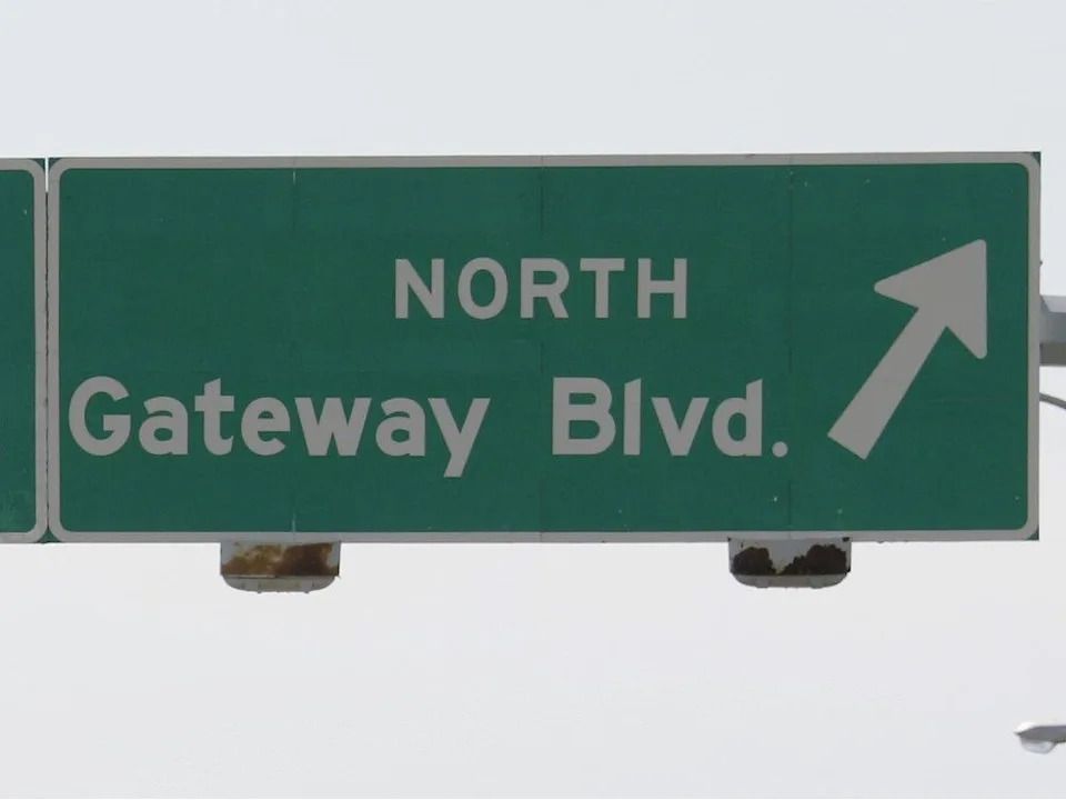 A road sign directs Edmonton motorists onto Gateway Boulevard near 23 Avenue and South Edmonton Common.