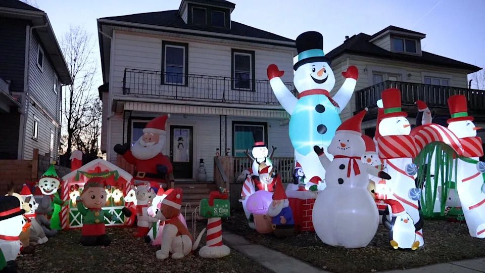 Holiday decorations cover a home on Crawford Avenue, one of dozens featured on a regional Christmas light map.