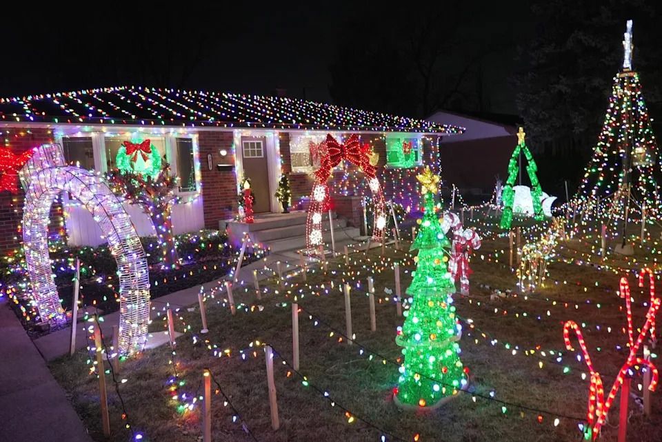 A decorated home on Dominion Boulevard stands out as families explore the interactive light display in the days leading up to Christmas.
