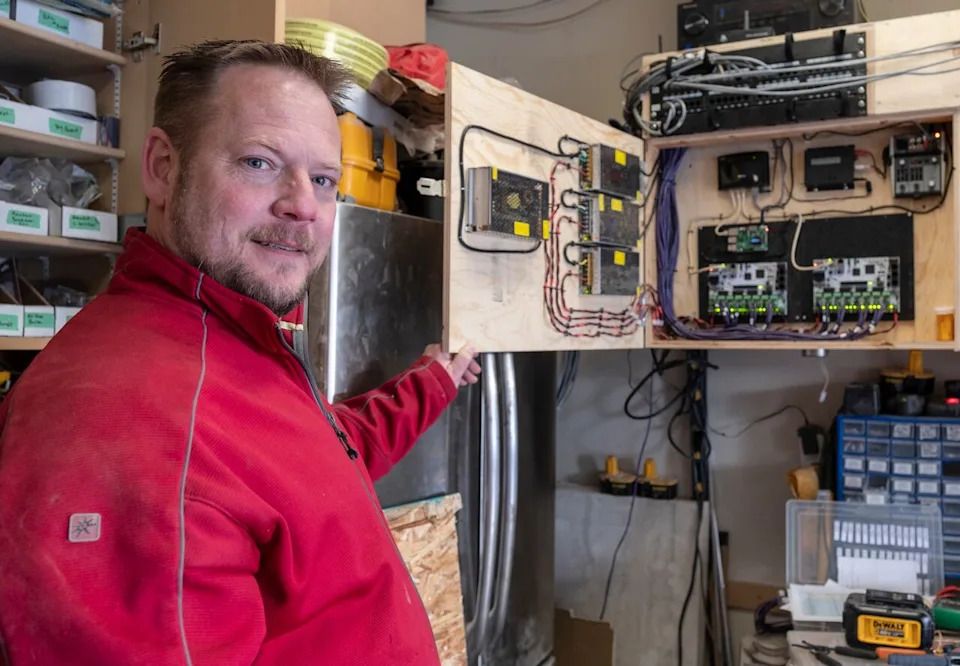 Trevor Allen takes pride in his holiday light show that he controls with care. The former DJ has always enjoyed working with lights and sound.