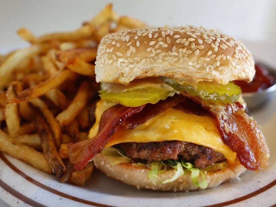 Cheddar Bacon Burger and fries at Good Neighbour on Elgin Street.