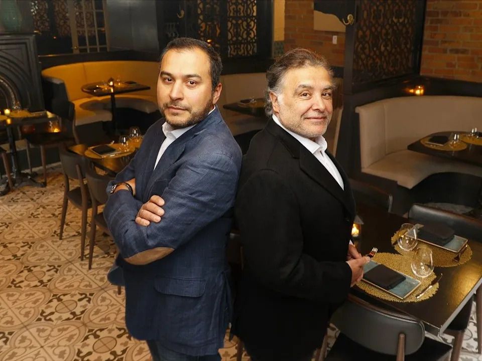 Tony Garcia, left, and Hussain Ruhal, the co-owners of Fairouz, pose for a photo in April 2025.