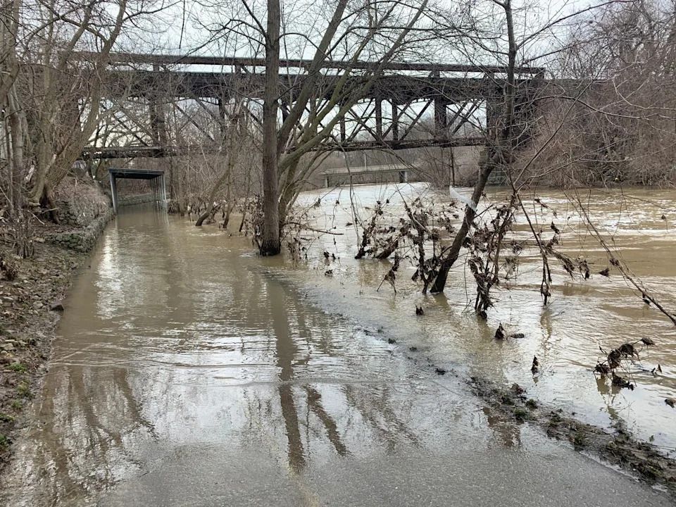 Pedestrians beware, sections of London's Thames Valley Parkway (TVP) are shown under water along the Thames River near Ivey Park on April 3, 2023.