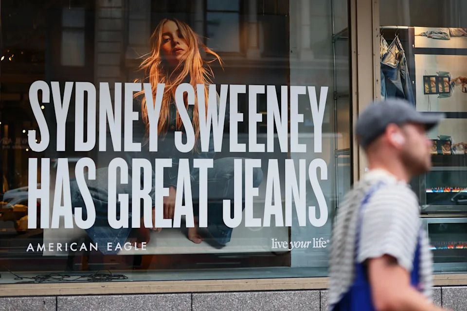 NEW YORK, NEW YORK - AUGUST 01: A window display of actress Sydney Sweeney is seen on a window of an American Eagle store on August 01, 2025 in New York City. American Eagle’s recent denim ad campaign featuring Sweeney has drawn backlash for language and imagery that critics say echoes eugenics-era rhetoric, following a tagline referencing “great genes” alongside visuals of Sweeney in blue jeans. (Photo by Michael M. Santiago/Getty Images)