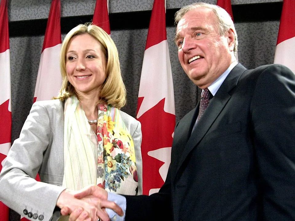 Former Conservative MP Belinda Stronach and Prime Minister Paul Martin hold a news conference to announce her defection to the Liberal Party in May 2005.