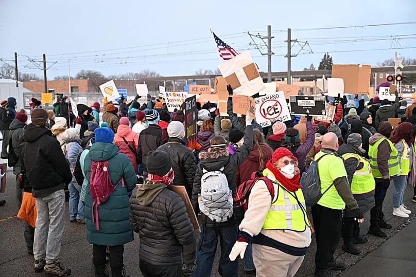 Protesters gather outside the Bishop Henry Whipple Federal Building in Minneapolis, 8 January, 2026