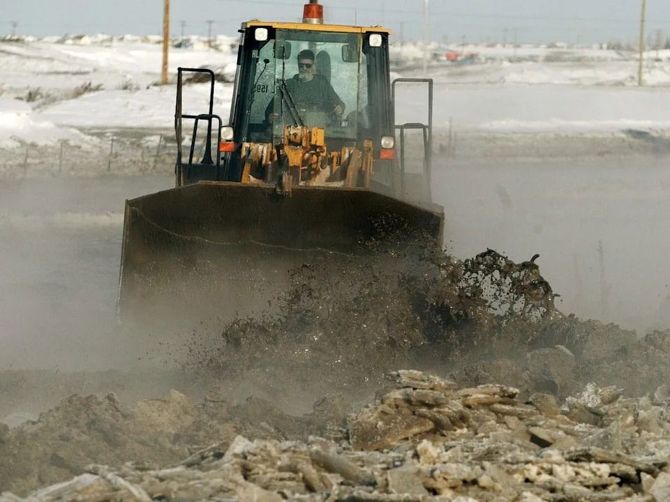 City of Calgary crews were kept busy on Jan. 25, 2004, trying to contain and clean up a major water main break along McKnight Boulevard just east of Barlow Trail. The line break deprived a majority of households in northeast Calgary of water.