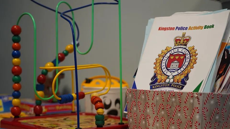 Children's toys and a colouring book are shown at the Victims Services of Kingston and Frontenac office in December 2025.